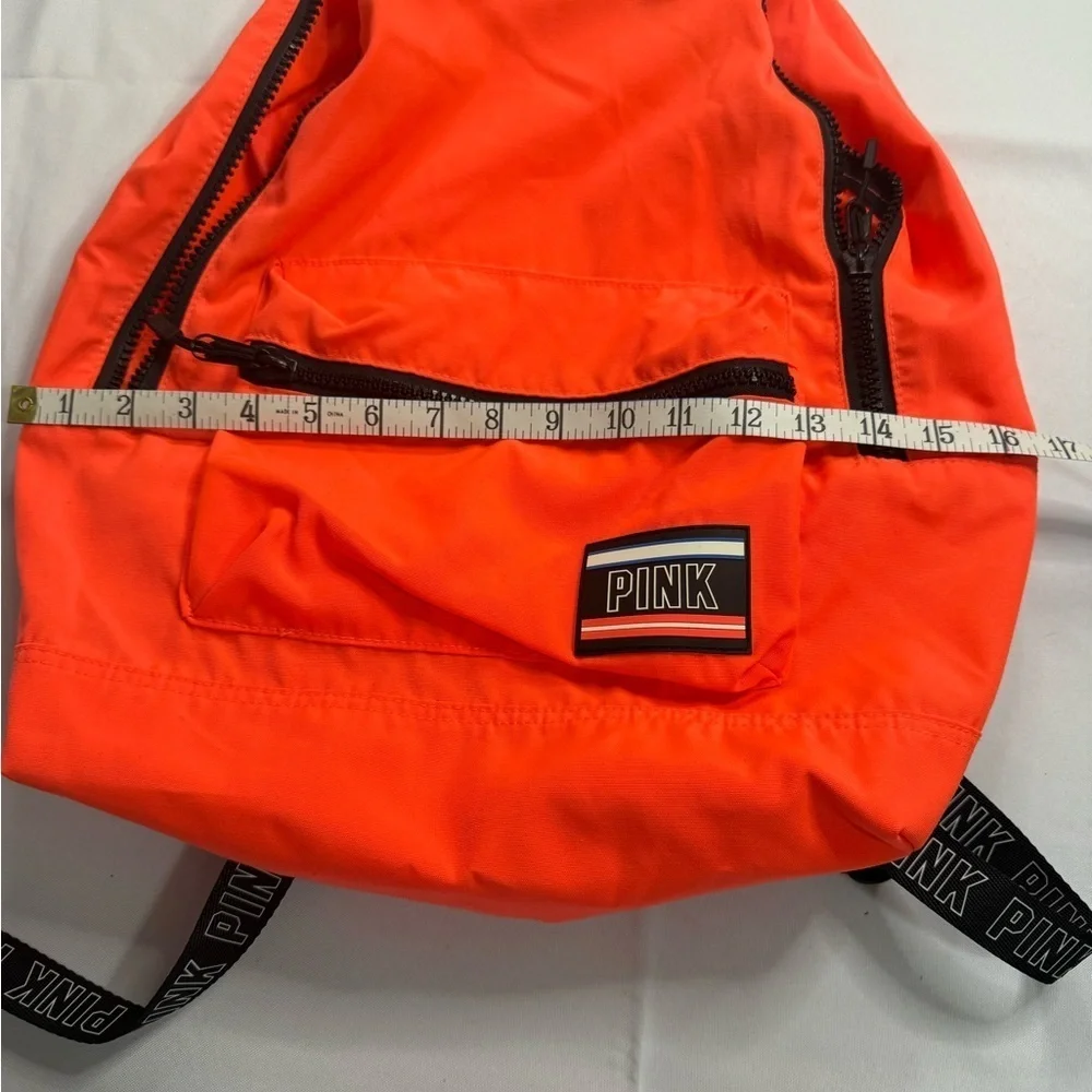 PINK Victoria's Secret Orange Backpack with Bold Design